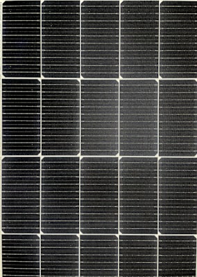 Solar panels on a UK residential roof connected to the grid