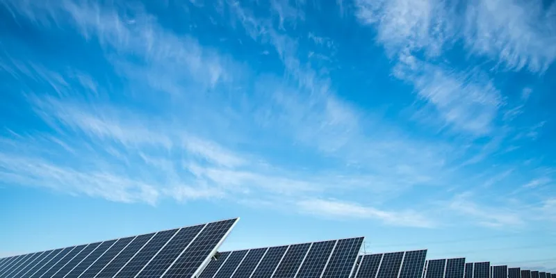 Solar panels being disassembled at a recycling facility